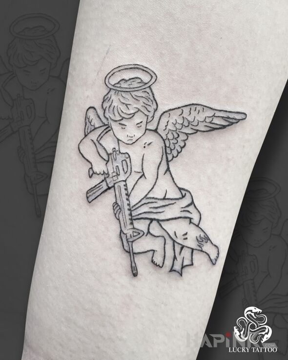 Tattoo Angel with a Rifle | Edgy Fineline in contour / linework style on the forearm