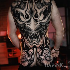 Tattoo Mask on the shoulder blades motif: dark style: graphic / illustrative