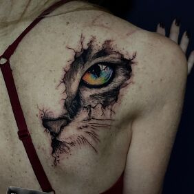 Tattoo Kot on the back motif: animals style: graphic / illustrative