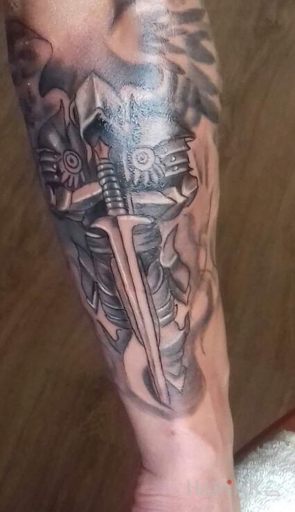 Tattoo Archanioł in angels motif on the forearm
