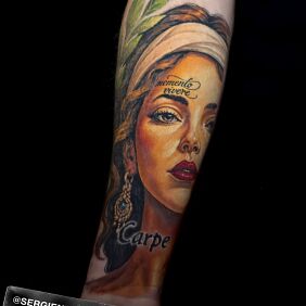 Tattoo Woman on the forearm motif: lettering style: graphic / illustrative