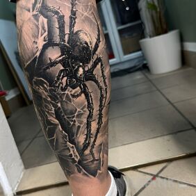 Tattoo Groźny pająk on the calf motif: fantasy style: realistic