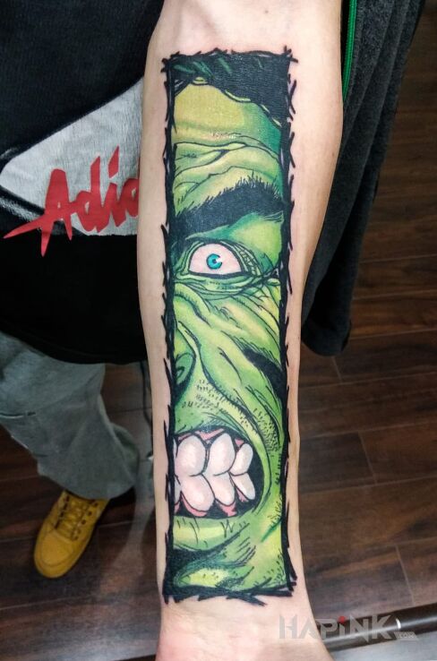 Tattoo Hulk in characters motif on the forearm