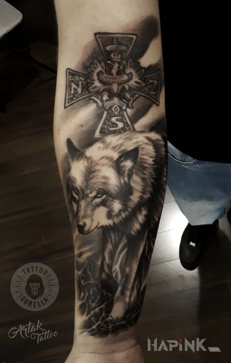 Tattoo Wilk in patriotic motif and realistic style on the forearm