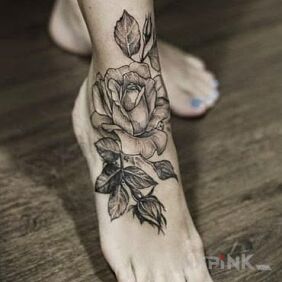 Tattoo Rose without color on the foot motif: flowers