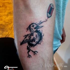 Tattoo Beak ;) on the forearm motif: animals