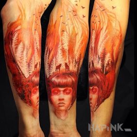 Tattoo Flames on the head on the forearm motif: faces