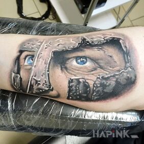 Tattoo Gladiator on the forearm motif: faces style: realistic