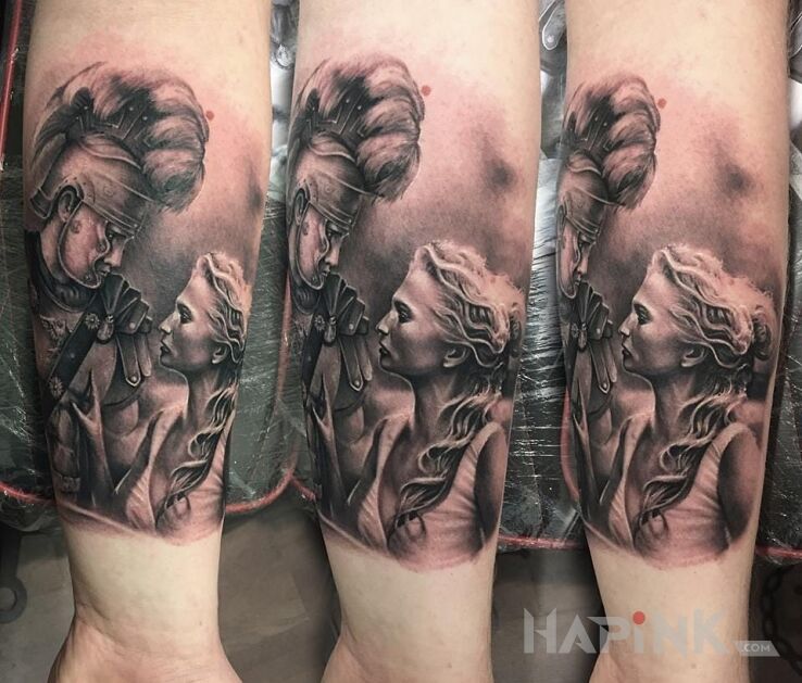 Tattoo Para kochanków in characters motif and realistic style on the forearm