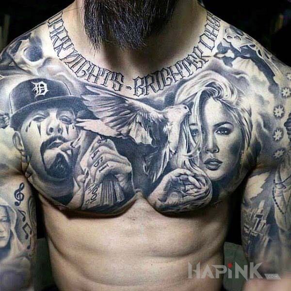 Tattoo Gangsta in faces motif and realistic style on the upper arm