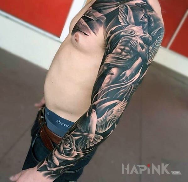 Tattoo Wyniosly aniol in angels motif on the upper arm