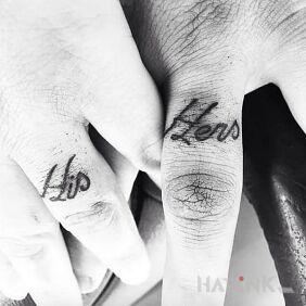 Tattoo He and she on the fingers motif: lettering