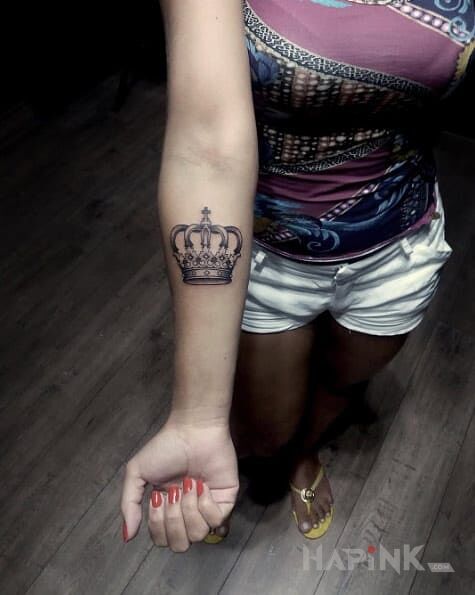 Tattoo Korona in other motif on the forearm