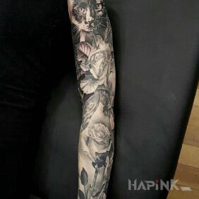 Tattoo Cat and roses on the forearm motif: flowers
