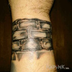Tattoo Brick wall on the wrist style: realistic