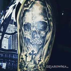Tatuaż Skull na ramieniu motyw: czaszki