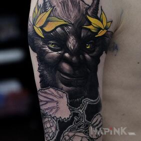 Tattoo Nikita's work with Bad Mojo Tattoo Gdansk. on the upper arm motif: characters