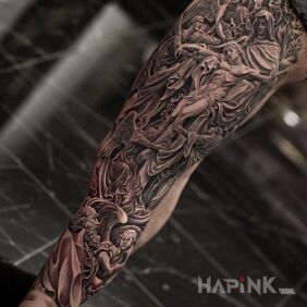 Tattoo Crucifixion of Jesus on the calf motif: angels