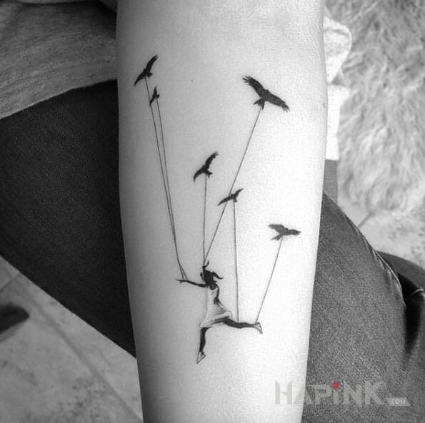 Tattoo Latająca dziewczyna :) in animals motif on the forearm