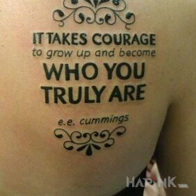 Tattoo E. e cummings on the shoulder blades motif: lettering