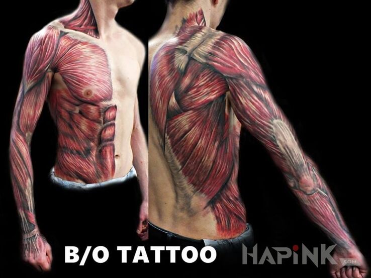 Tattoo Mięśnie in realistic style on the upper arm