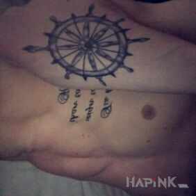 Tattoo Ship's rudder on the forearm motif: objects