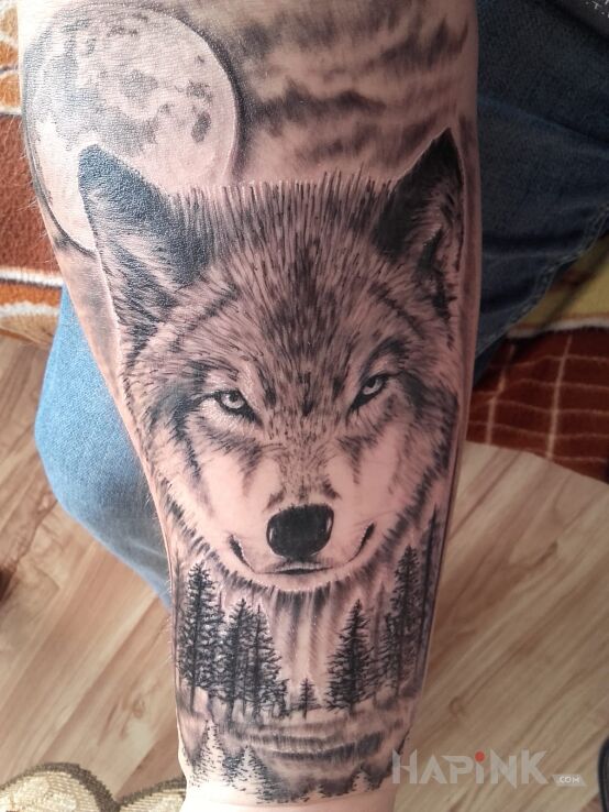 Tattoo Wilk in animals motif on the forearm