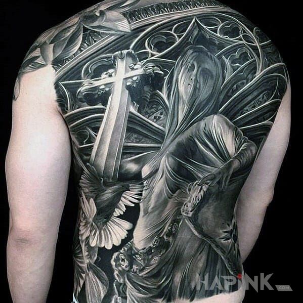 Tattoo Kościół in religious motif and realistic style on the back