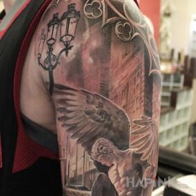 Tattoo Angel on the pavement on the upper arm motif: 3D