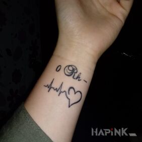Tattoo My blood type, which is very rare and universal, so that someone will save my life on the wrist motif: lettering