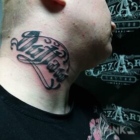 Tattoo Outlaw on the neck motif: lettering