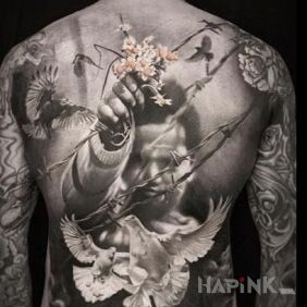 Tattoo Behind the barbed wire on the back motif: characters style: realistic
