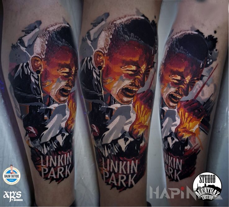 Tattoo Chester :) in faces motif and realistic style on the calf