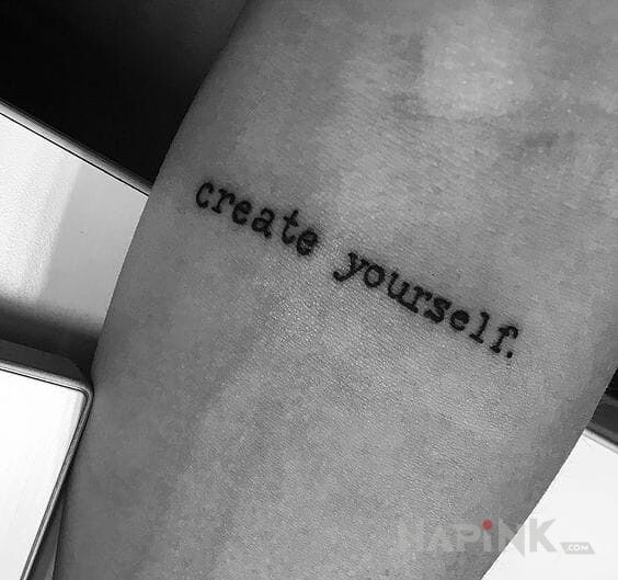 Tattoo Create yourself. in lettering motif on the forearm