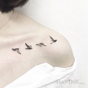 Tattoo Birds on the collarbone motif: animals