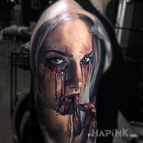 Tattoo Bloody tears on the upper arm motif: 3D style: realistic