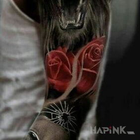 Tattoo V for vendetta on the upper arm motif: flowers