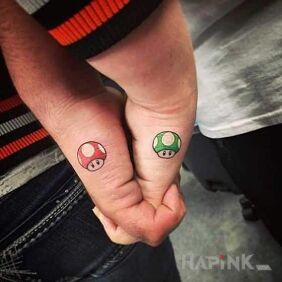 Tattoo Two mushrooms on the hand motif: characters