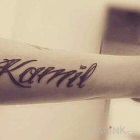 Tattoo Name on the forearm motif: lettering