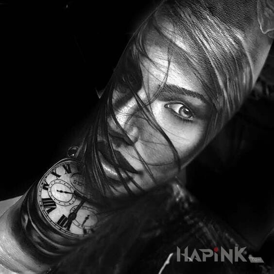 Tattoo Portret in faces motif and realistic style on the forearm