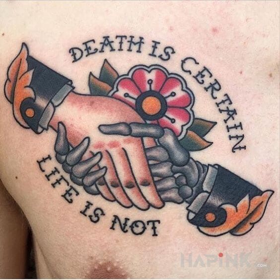 Tattoo Coś o życiu in flowers motif on the chest