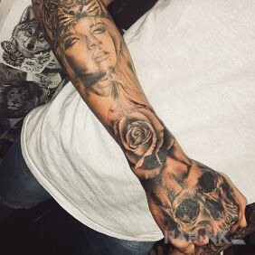 Tattoo :D on the hand motif: faces