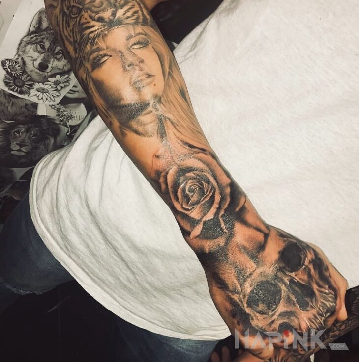 Tattoo :D in characters motif on the hand