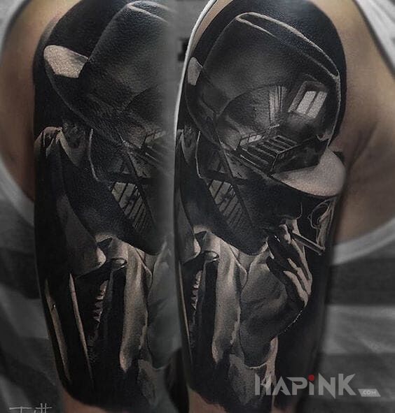 Tattoo Elegancja z fajką in characters motif and realistic style on the upper arm