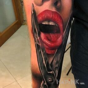 Tattoo Scissors on the forearm motif: faces style: realistic