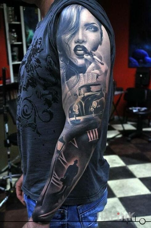 Tattoo Dawne czasy in sleeves motif and realistic style on the forearm