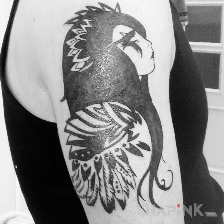 Tattoo Forest Elf in characters motif on the upper arm