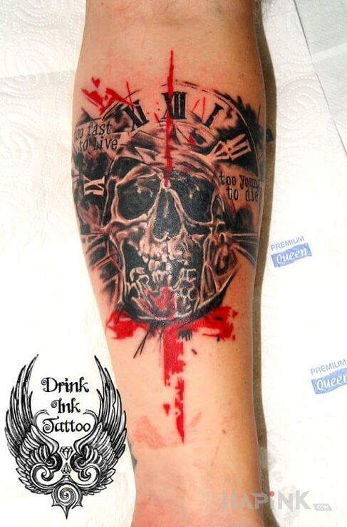 Tattoo TOO FAST TO LIFE in skulls motif on the forearm