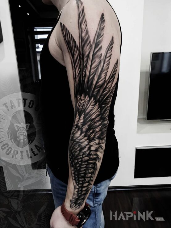 Tattoo Skrzydło in sleeves motif on the upper arm