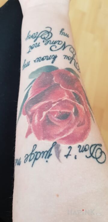 Tattoo Zyciowe in lettering motif on the forearm